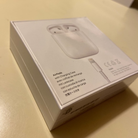 BRAND NEW AIRPODS WITH CHARGING CASE - Picture 2 of 2